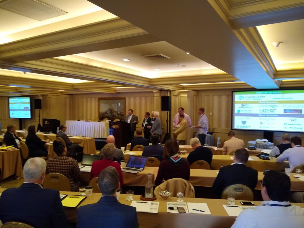 Audience and speakers at an SSP annual conference session
